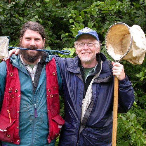 Rob Cannings (right) teaching a kid (Darren Copley, left) how to collect dragonfly larvae in the field (Prince Rupert, BC, 2005).