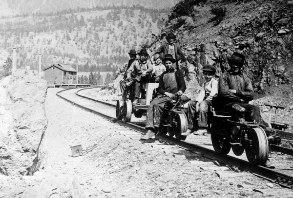 Group on speeders near the Pacific Great Eastern station at Lillooet.